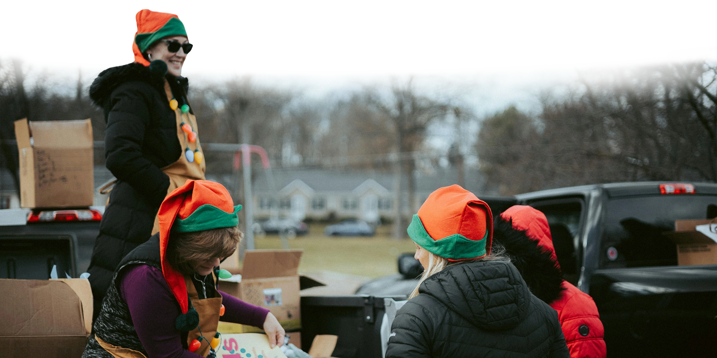 Volunteers handing out gifts.